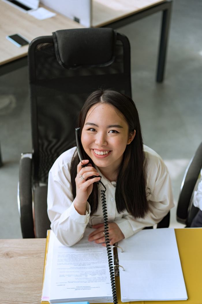 Team member responding to a customer inquiry by phone